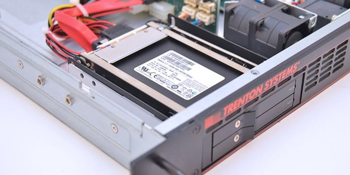 This is a photo of a Trenton Systems server with the solid-state drive (SSD) exposed.